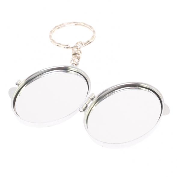 Складное зеркало брелок из содалита овальное 126614